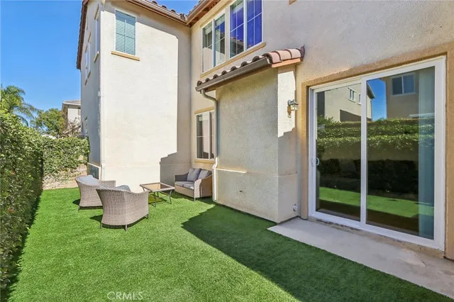 a view of a back yard of the house