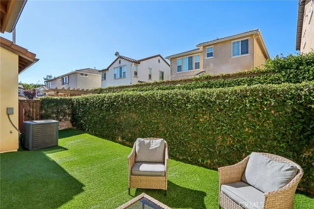 a house view with a garden space