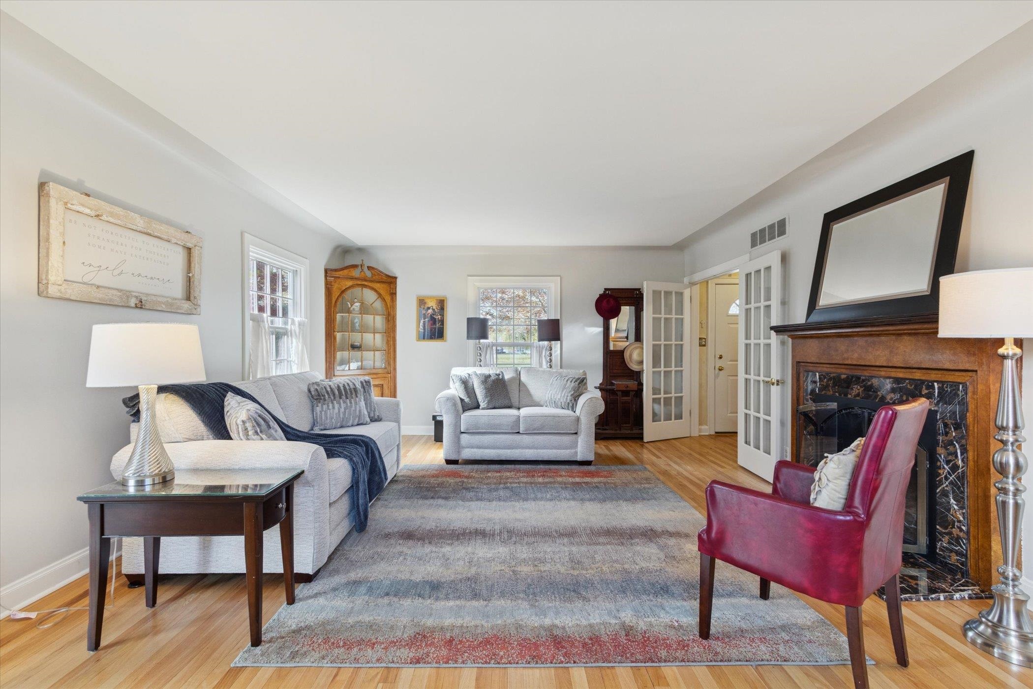 1408 Ave D Sterling, IL 61081 - Photo 16 of 55 a living room with furniture and a fireplace