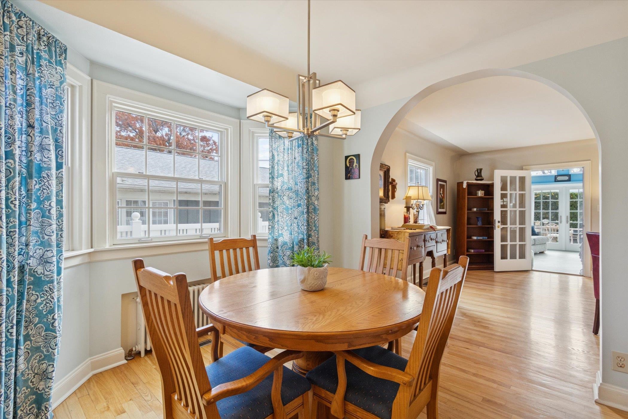 1408 Ave D Sterling, IL 61081 - Photo 22 of 55 a view of a dining room with furniture window and wooden floor