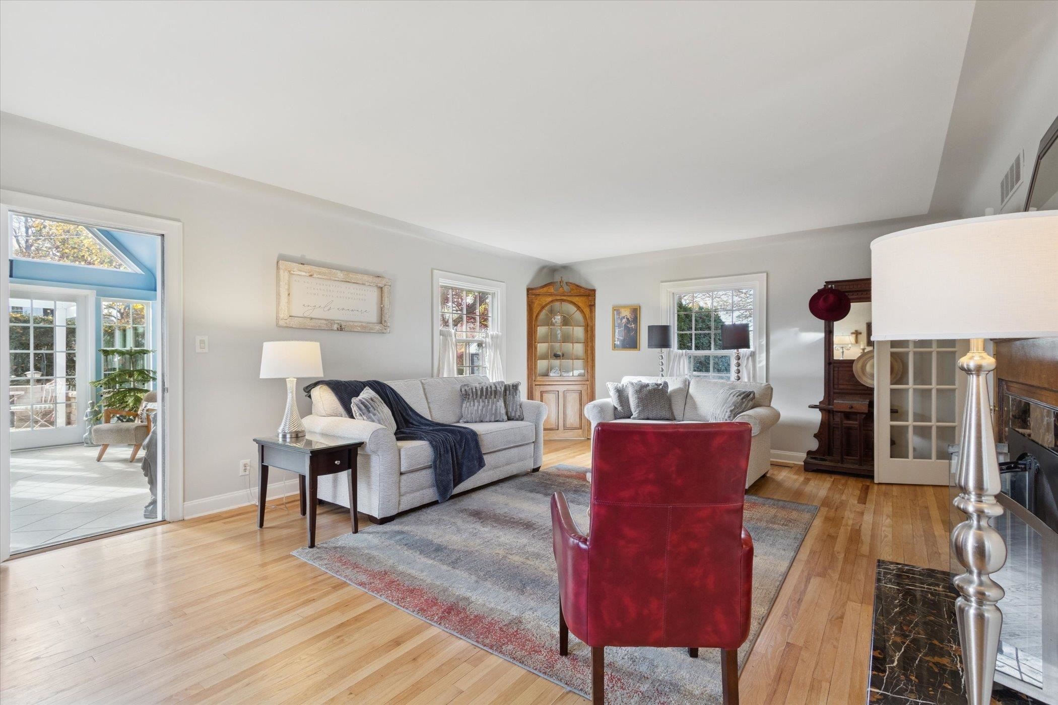 1408 Ave D Sterling, IL 61081 - Photo 28 of 56 a living room with furniture and a wooden floor