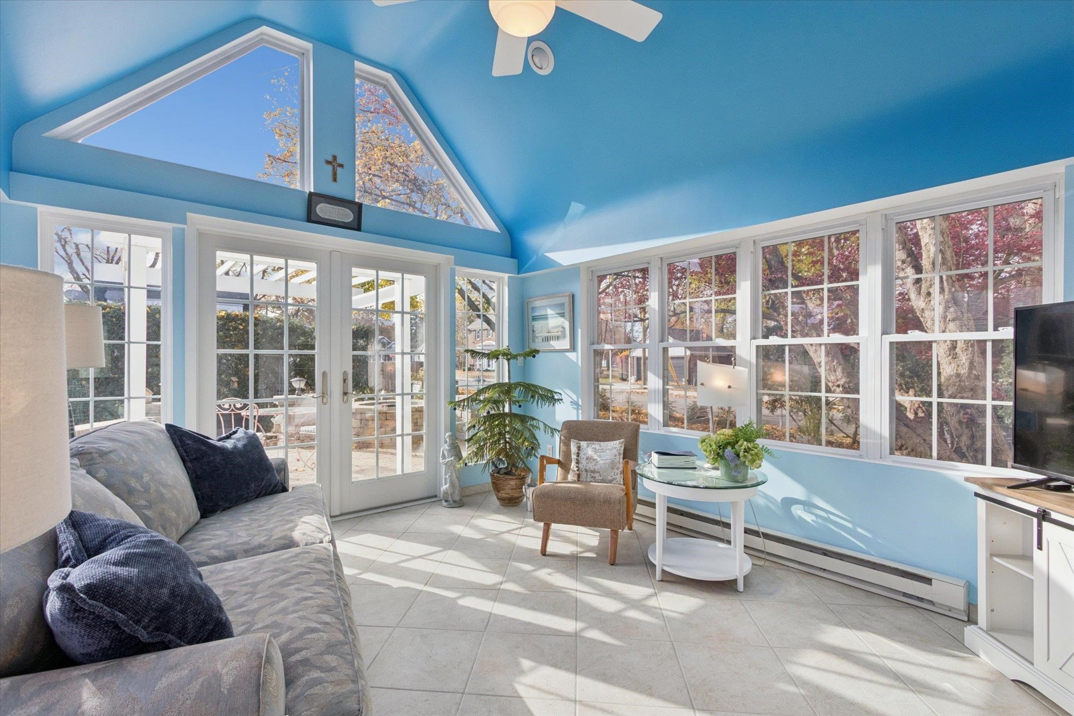 1408 Ave D Sterling, IL 61081 - Photo 31 of 56 a living room with furniture and floor to ceiling windows