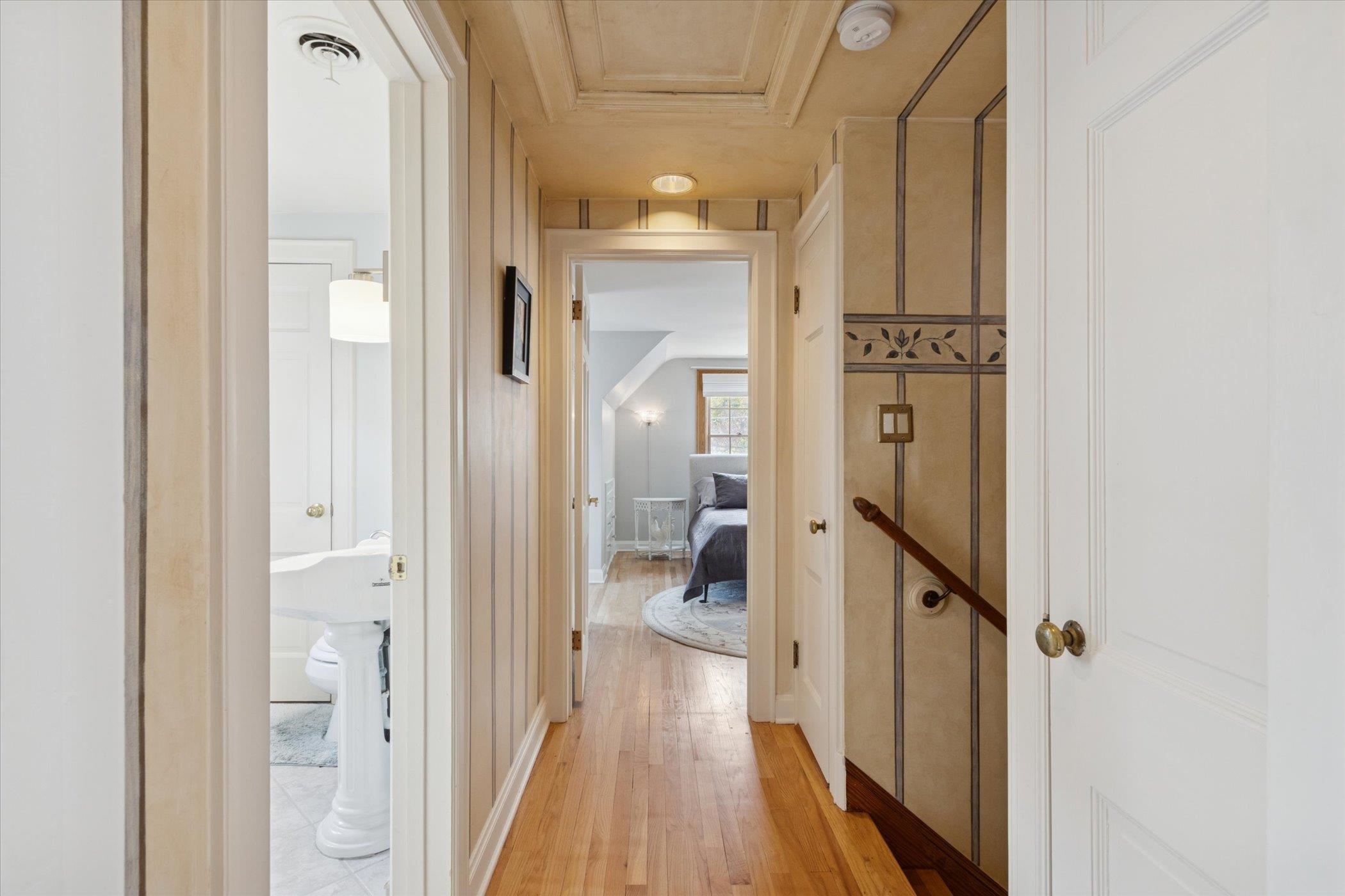 1408 Ave D Sterling, IL 61081 - Photo 37 of 55 a view of a hallway with wooden floor and staircase