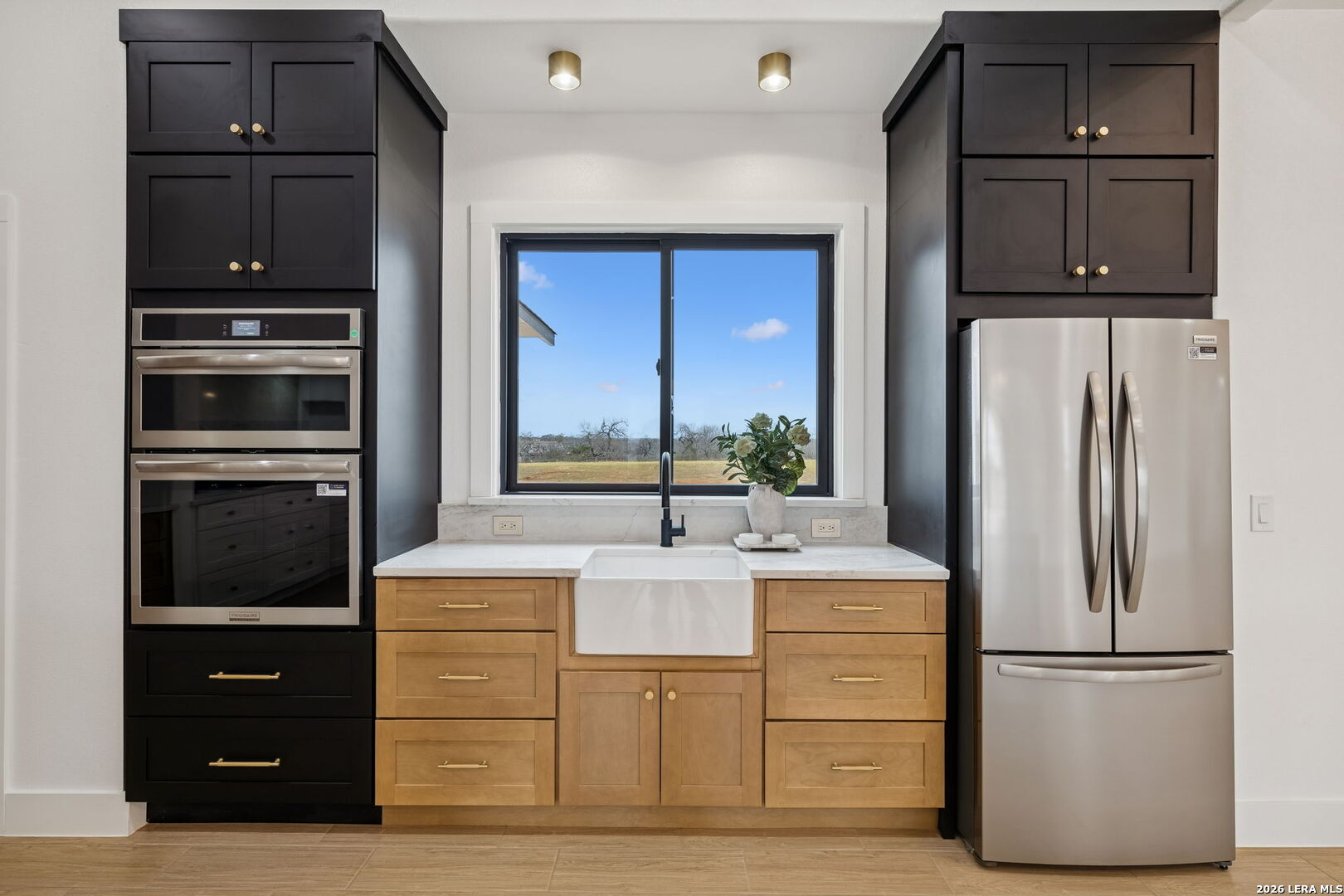 191 Hidden Ranch Court Floresville, TX 78114 - Photo 12 of 38 a kitchen with appliances cabinets and furniture