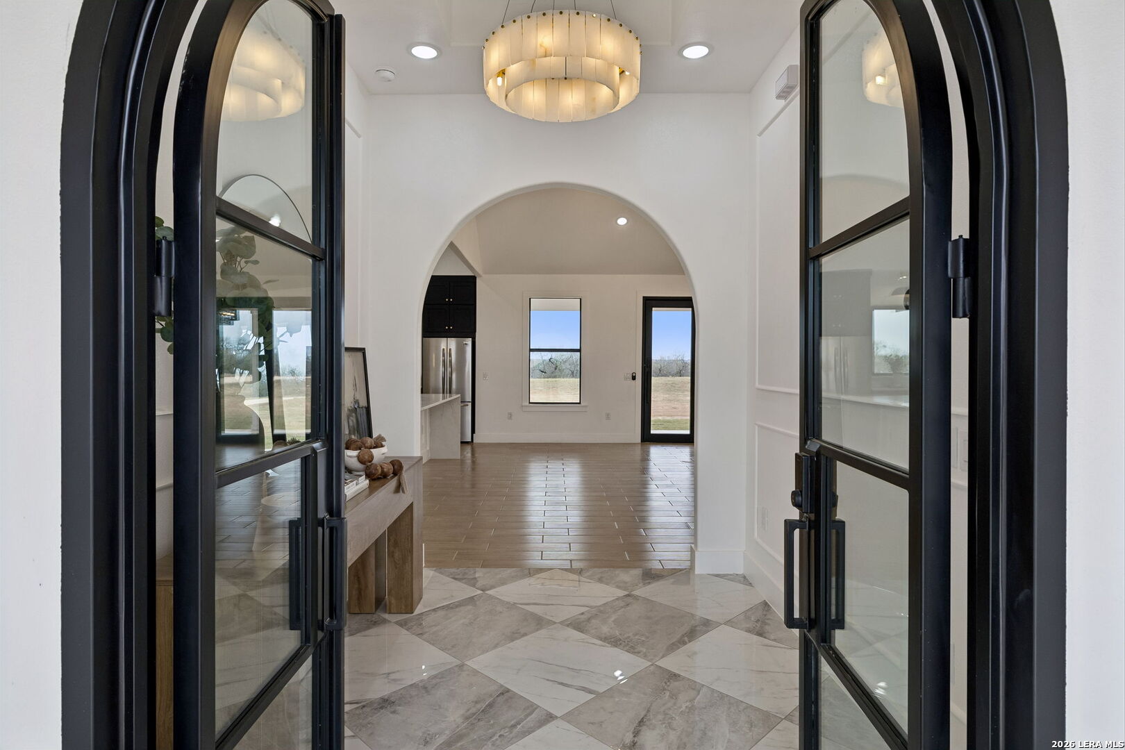 191 Hidden Ranch Court Floresville, TX 78114 - Photo 2 of 38 a view of a entryway door with a living room