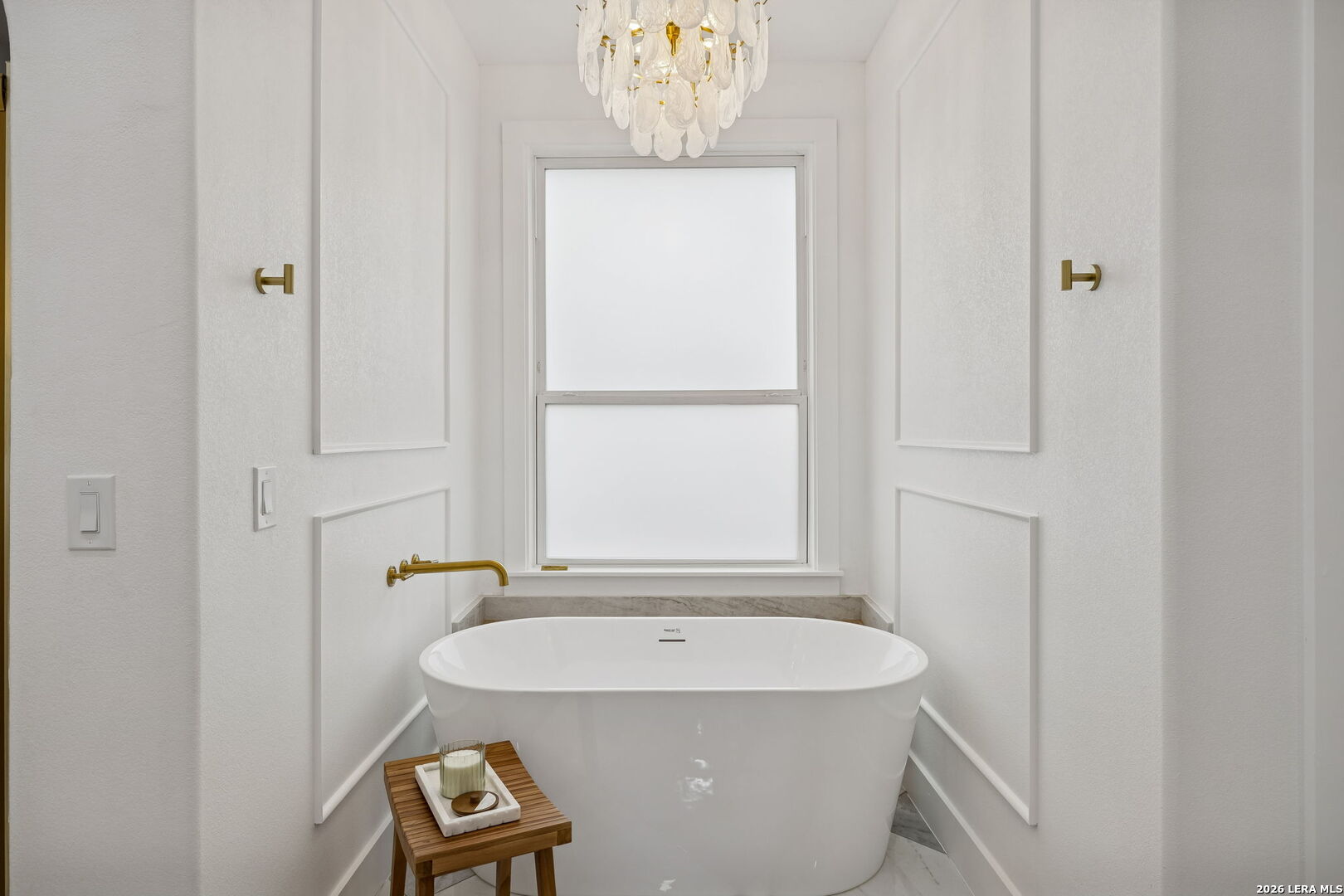 191 Hidden Ranch Court Floresville, TX 78114 - Photo 21 of 38 a bathroom with a sink and a window