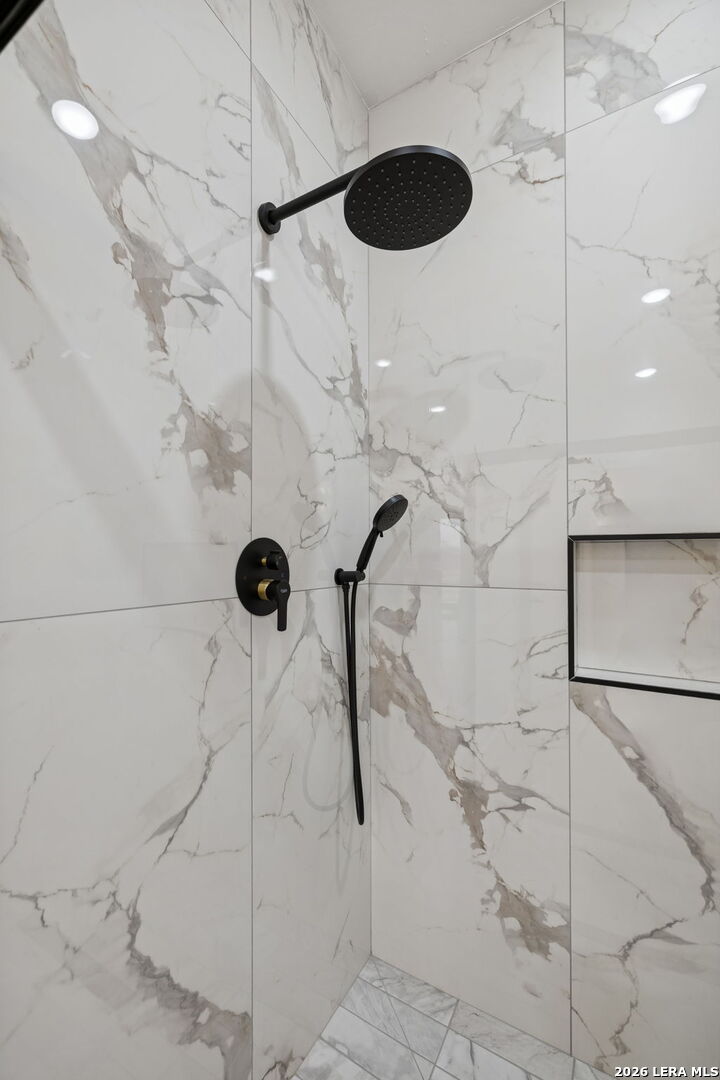 191 Hidden Ranch Court Floresville, TX 78114 - Photo 25 of 38 a bathroom with a shower