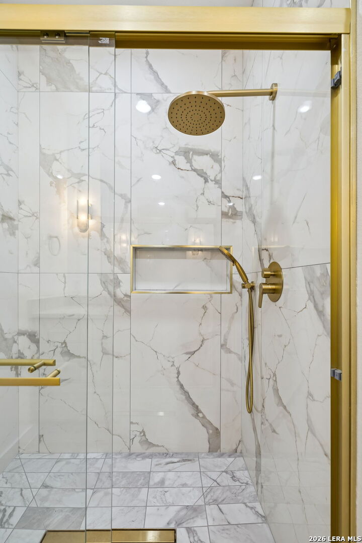 191 Hidden Ranch Court Floresville, TX 78114 - Photo 28 of 38 a bathroom with a shower