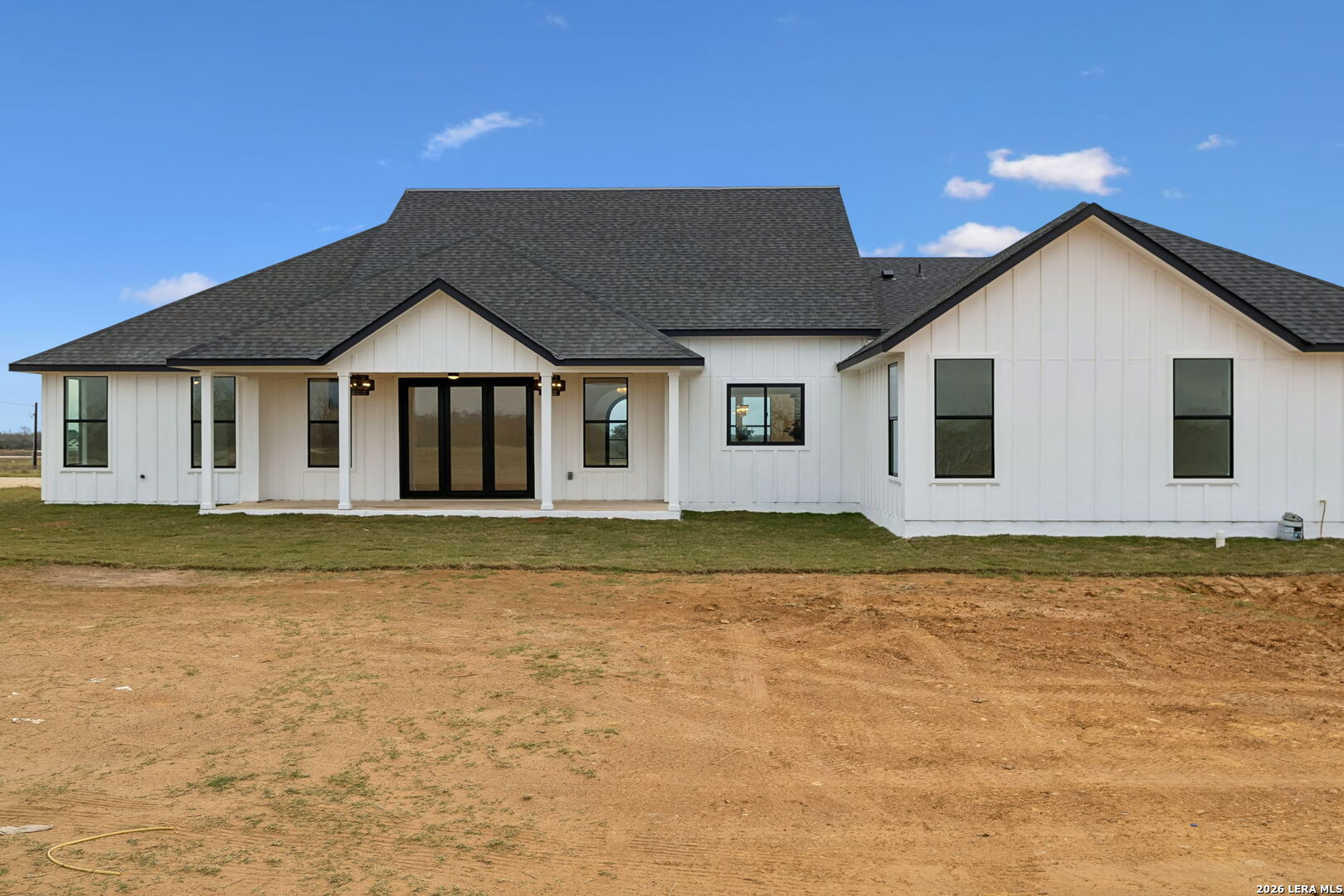 191 Hidden Ranch Court Floresville, TX 78114 - Photo 35 of 38 a view of a house with a swimming pool