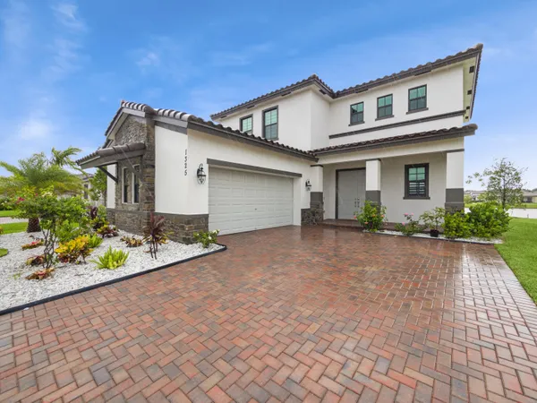 a view of a patio with a yard