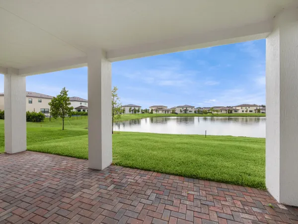 a view of a lake with a big yard