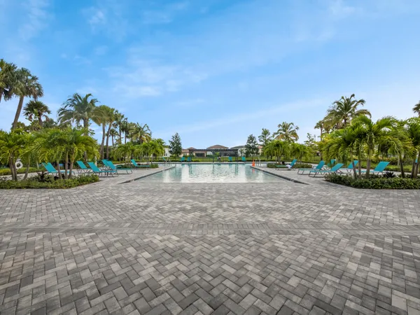 a view of a room with lots of wooden furniture