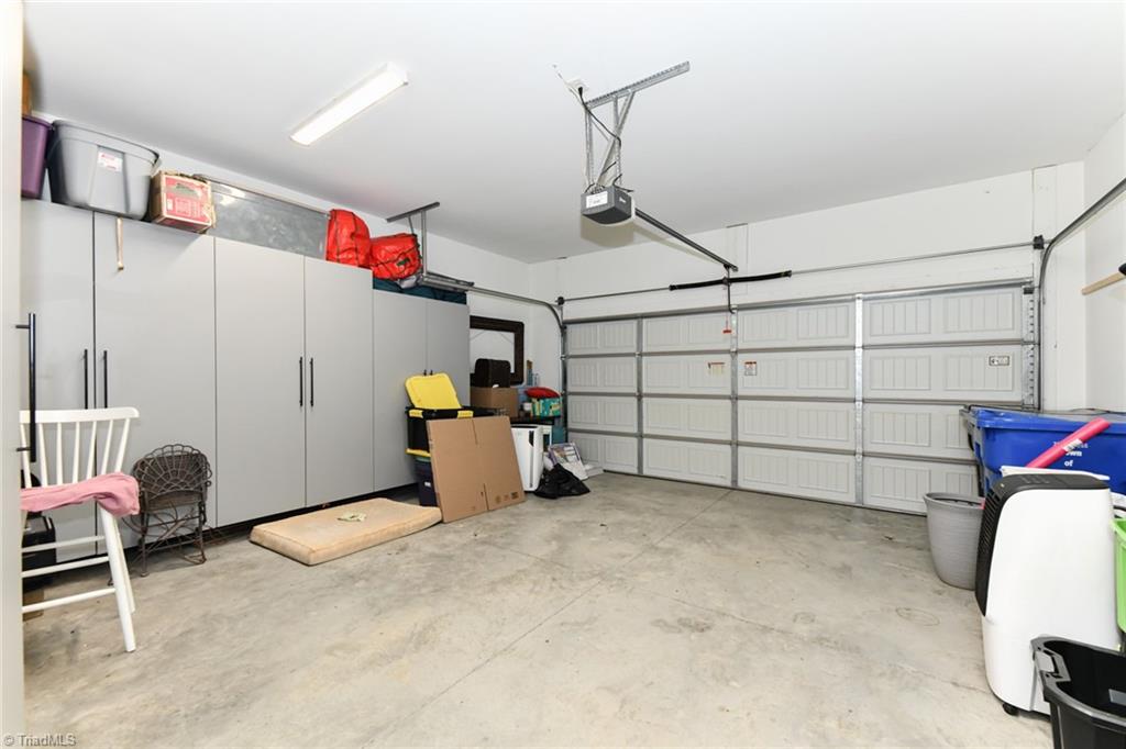 2024 Welden Ridge Road Kernersville, NC 27284 - Photo 24 of 28 Cabinets in garage can stay with acceptable offer.