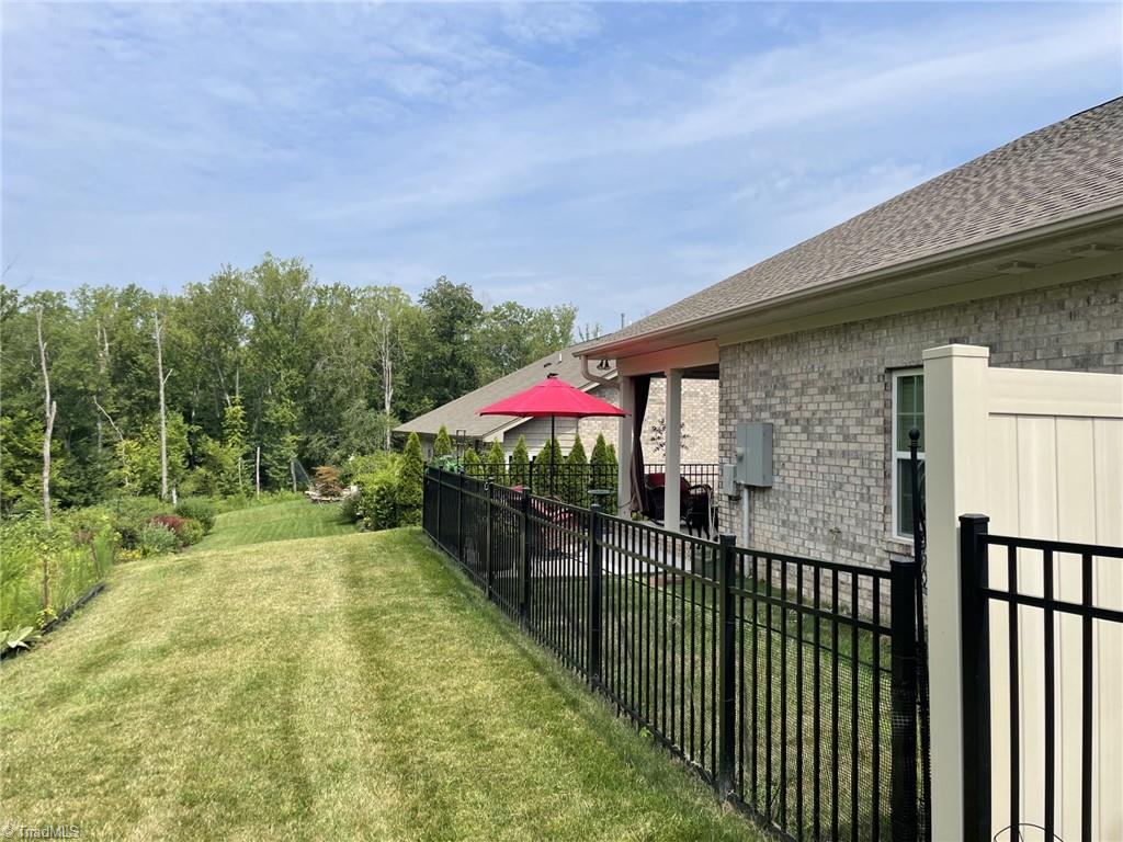 2024 Welden Ridge Road Kernersville, NC 27284 - Photo 25 of 28 Fenced backyard patio