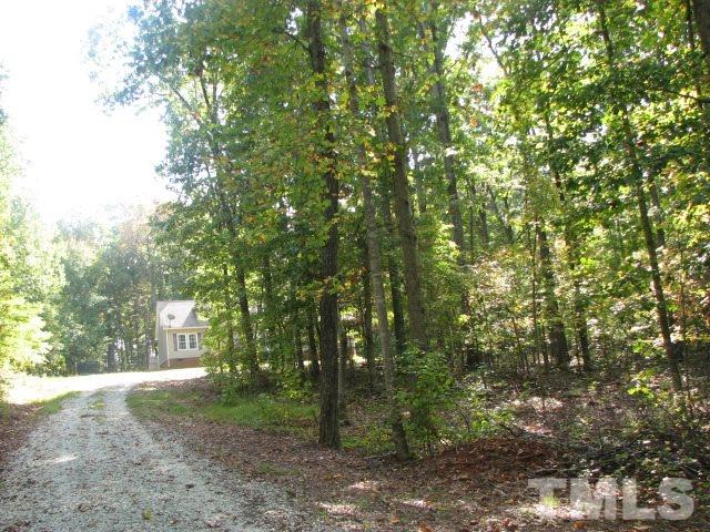 7821 McKee Road Rougemont, NC 27572 - Photo 5 of 25 a view of a house with a tree