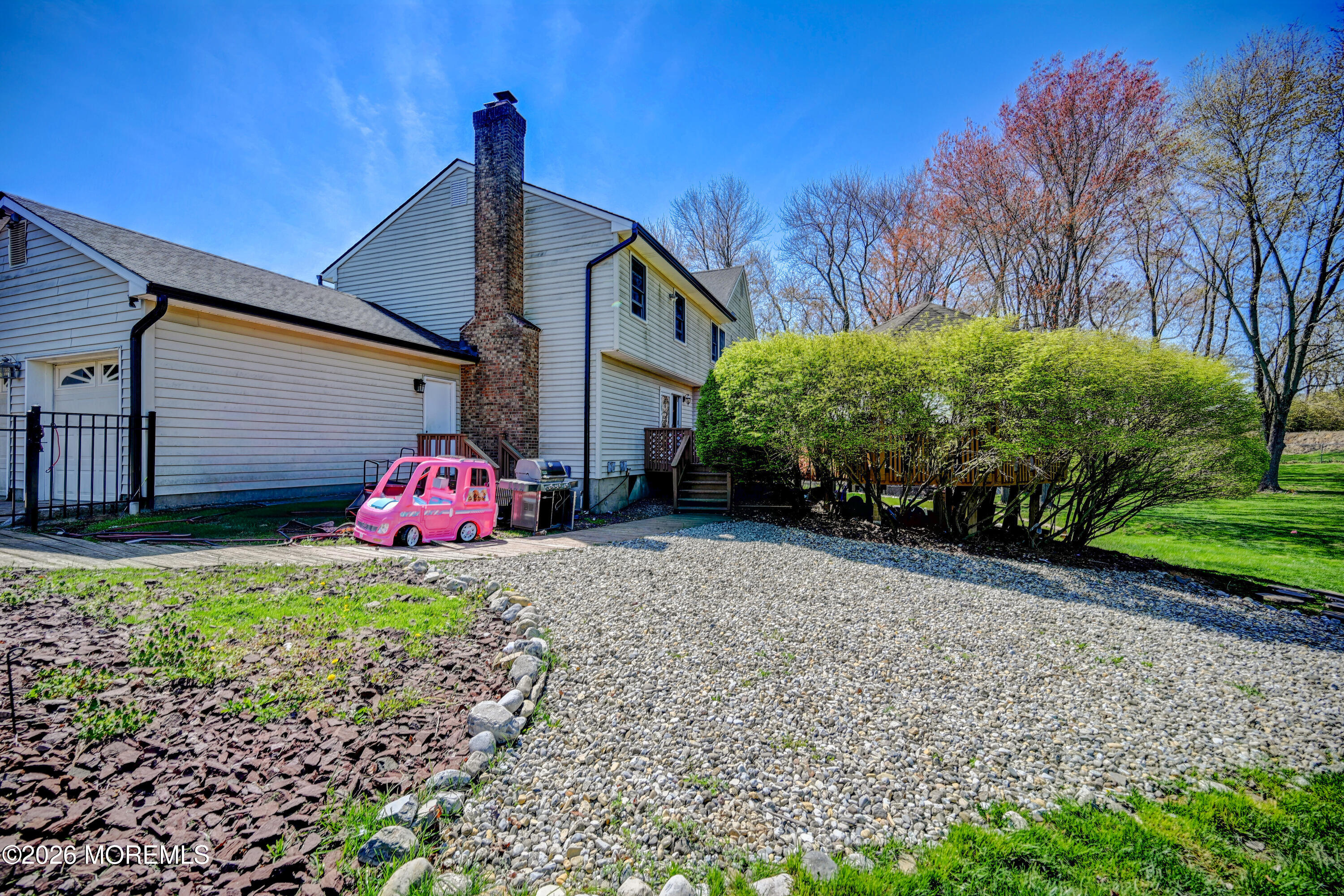 23 Red Hawk Road South Colts Neck, NJ 07722 - Photo 51 of 70 52-Back of Home-Side View