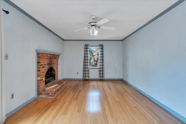 a kitchen with stainless steel appliances granite countertop a stove a sink dishwasher and a refrigerator