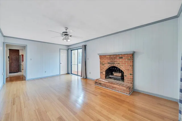 a view of workspace with window and a ceiling fan