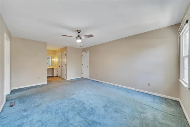 a view of a livingroom with furniture and garage