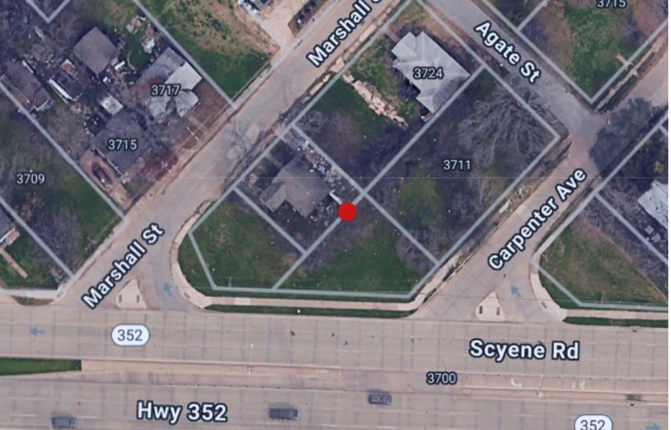 3711 Carpenter Avenue Dallas, TX 75210 - Photo 5 of 9 a view of a building with a tree