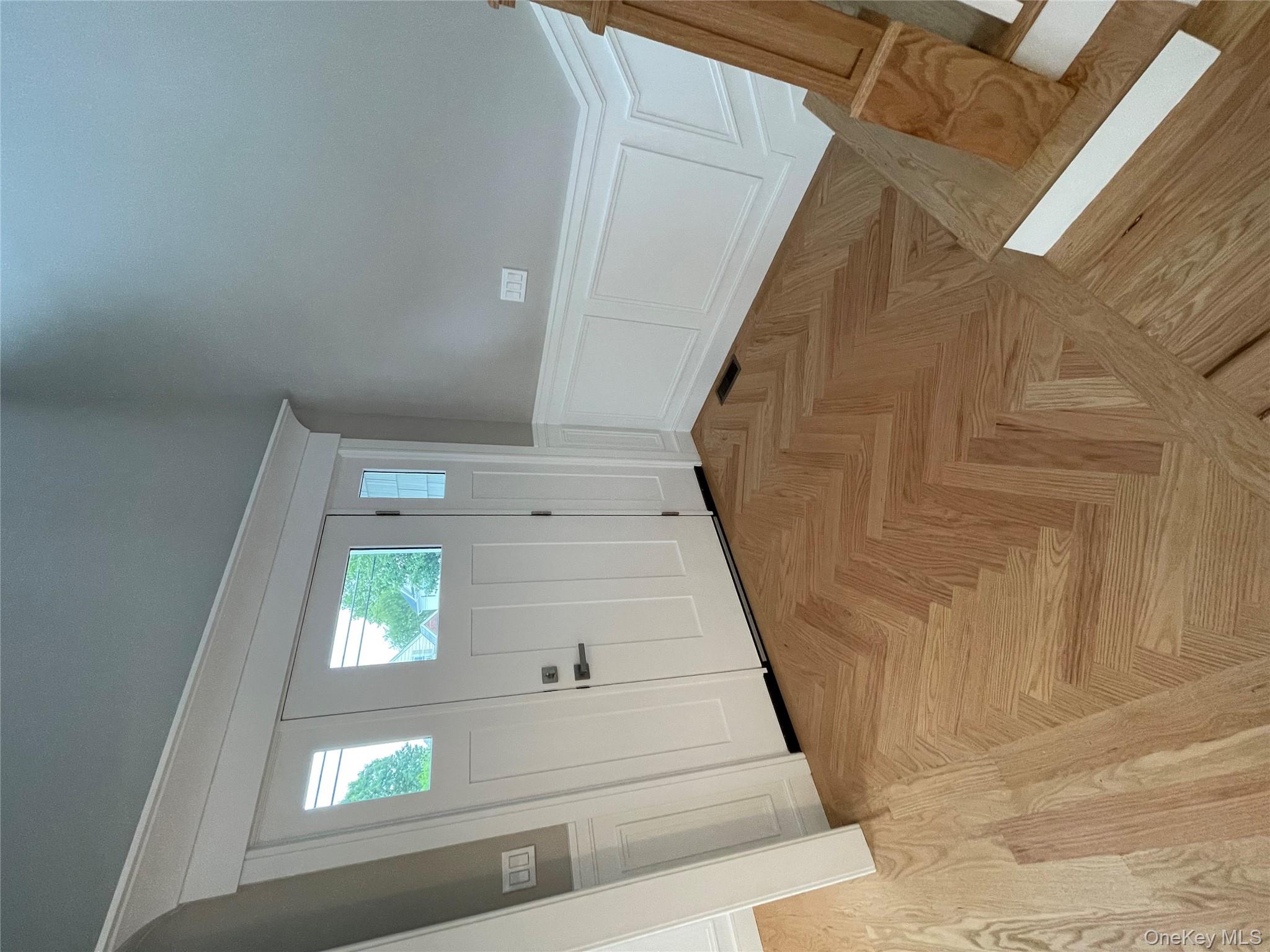 477 Andrews Road, Unit LOT A Mineola, NY 11501 - Photo 10 of 21 a view of empty room with wooden floor