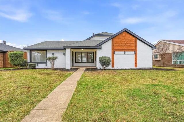 a view of house with garden space