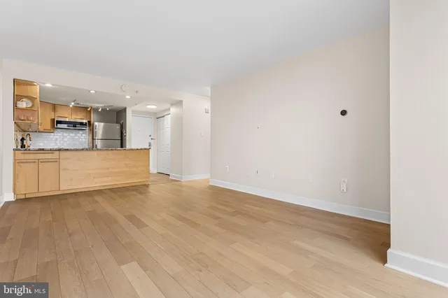 a view of a kitchen with a sink and a dishwasher