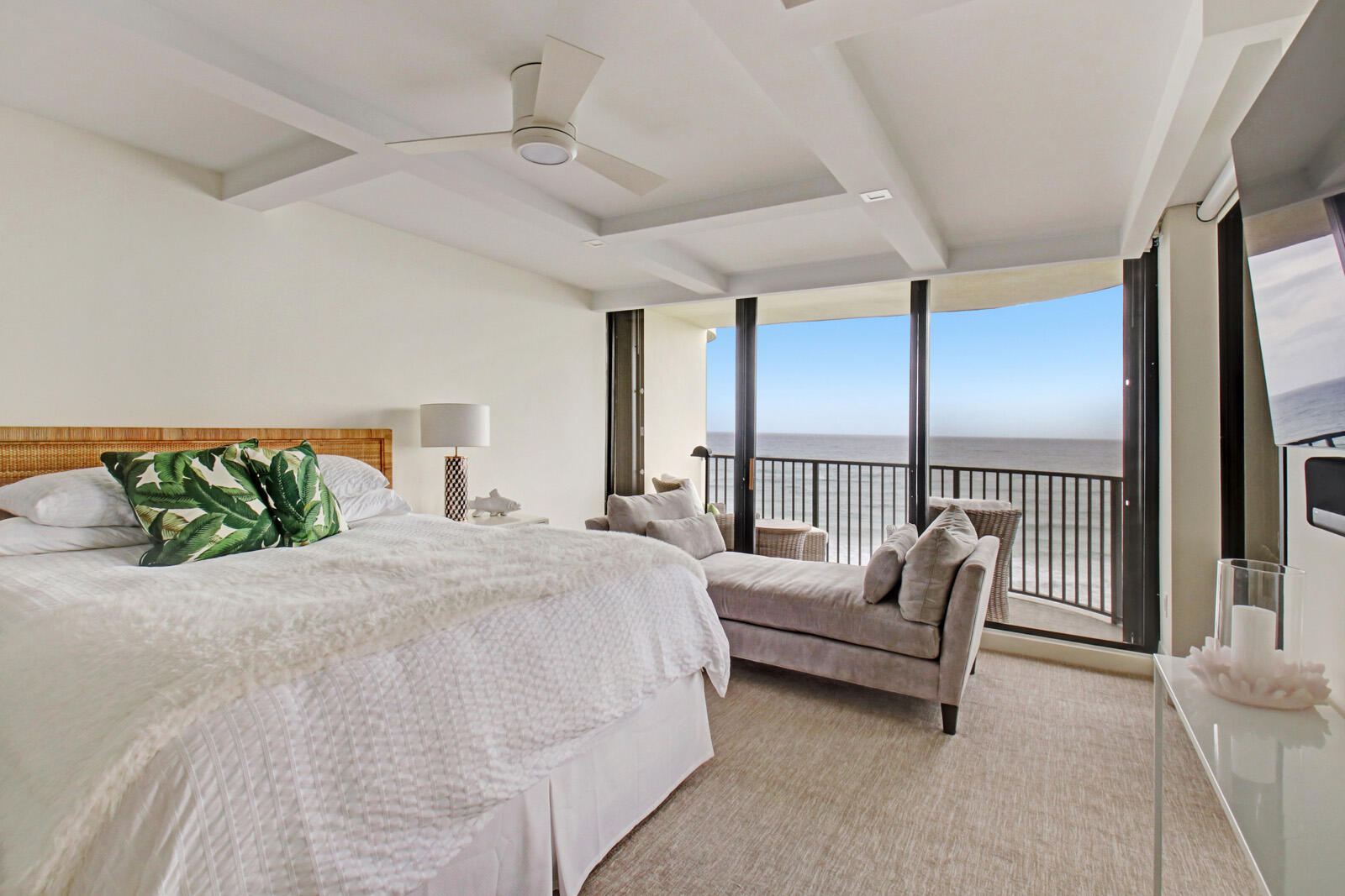 400 South Beach Road, Unit 504 Tequesta, FL 33469 - Photo 11 of 22 a spacious bedroom with a bed and a large window
