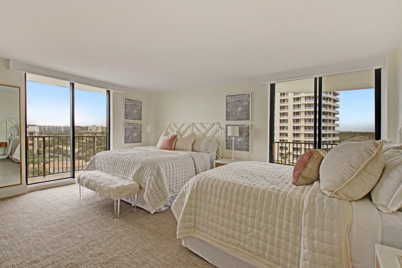 400 South Beach Road, Unit 504 Tequesta, FL 33469 - Photo 14 of 22 a bedroom with two beds and large window