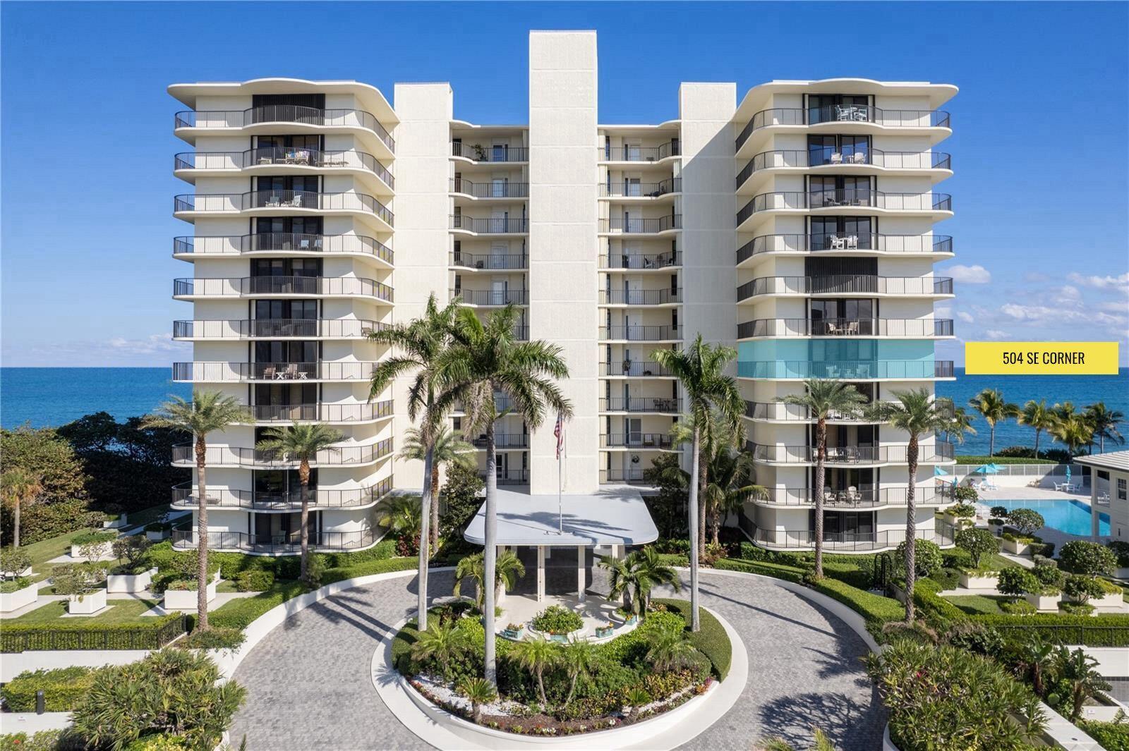 400 South Beach Road, Unit 504 Tequesta, FL 33469 - Photo 2 of 22 a front view of a building with a yard