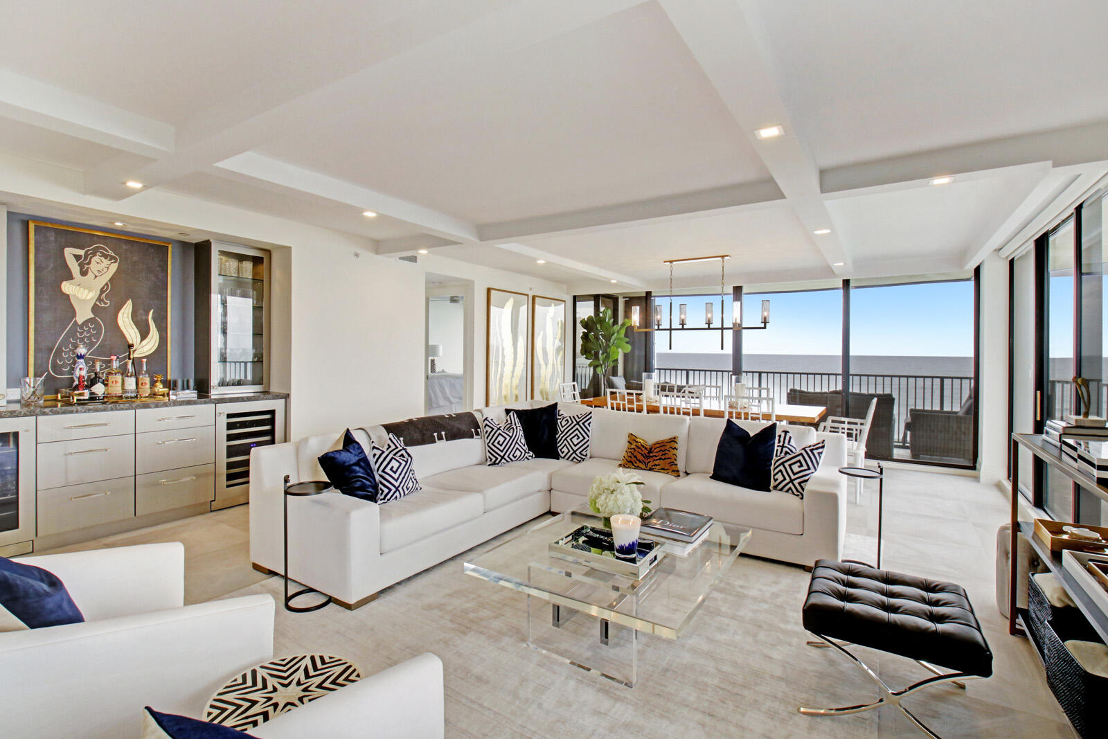 400 South Beach Road, Unit 504 Tequesta, FL 33469 - Photo 6 of 22 a living room with furniture kitchen view and a large window