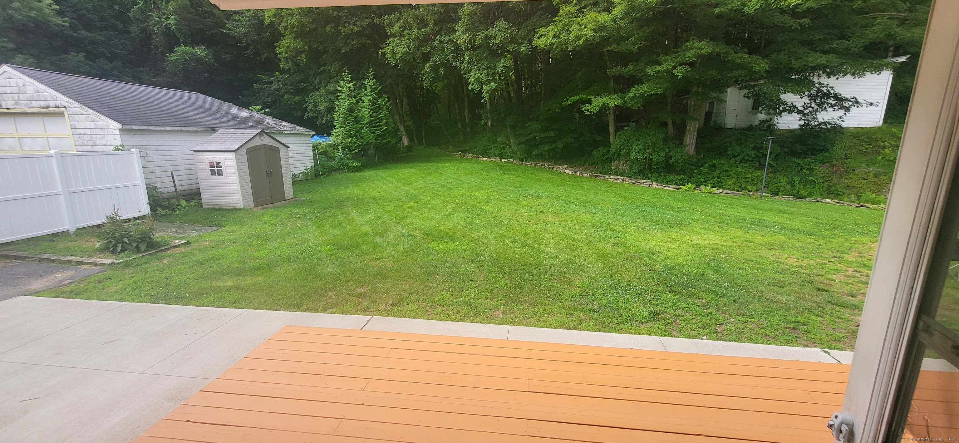179 High Street Sprague, CT 06330 - Photo 8 of 9 a view of a backyard of the house