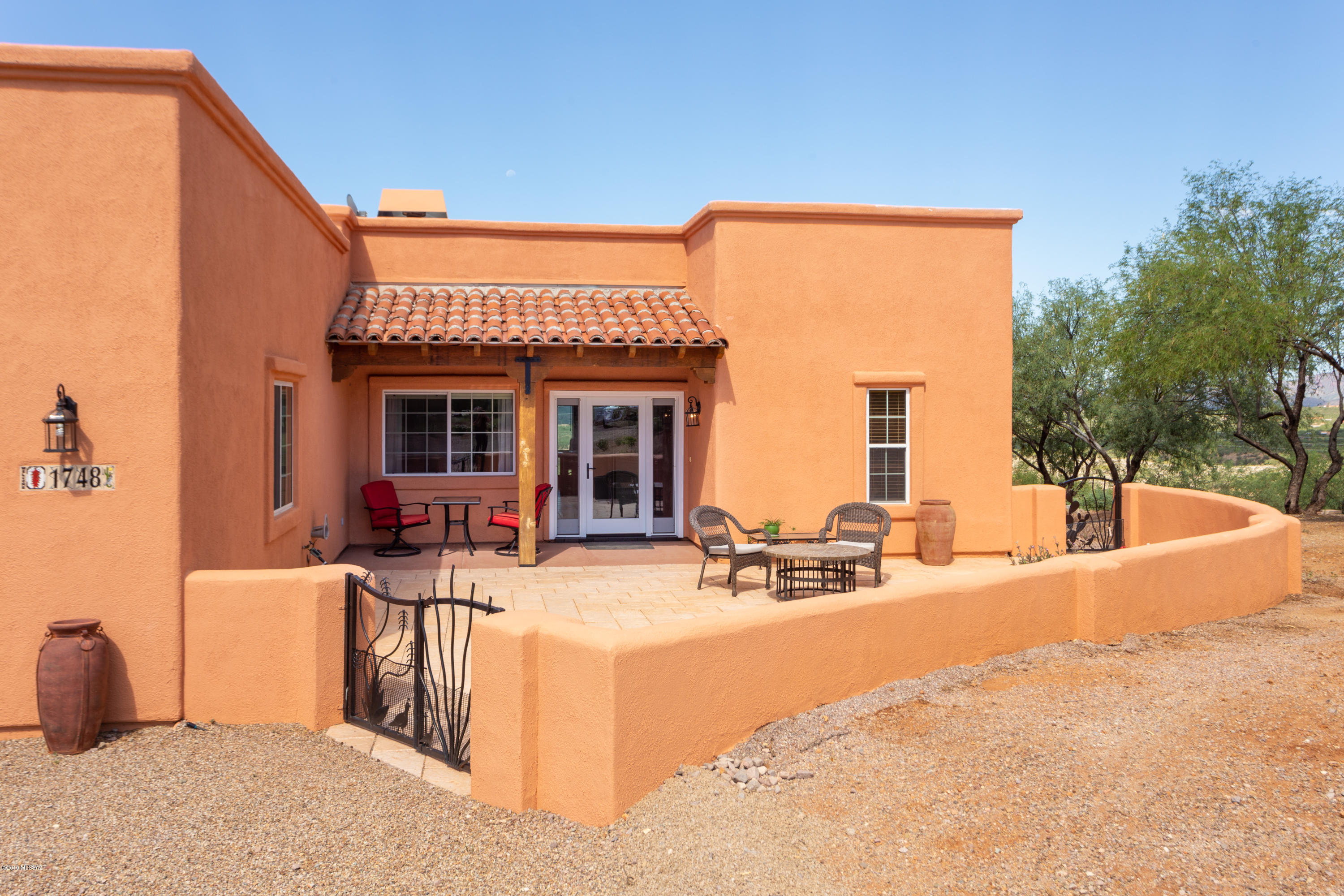 1748 Avenida Pastor Rio Rico, AZ 85648 - Photo 5 of 28 a view of a house with outdoor seating