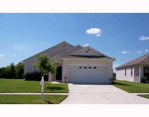 5250 Prairie View Way Wesley Chapel, FL 33545 - Photo 1 of 1 a front view of a house with a yard