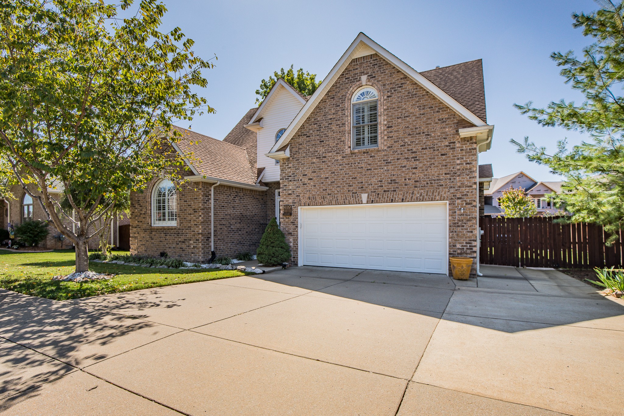 4119 Lazarus Way Murfreesboro, TN 37128 - Photo 2 of 47 a front view of a house with a yard and garage