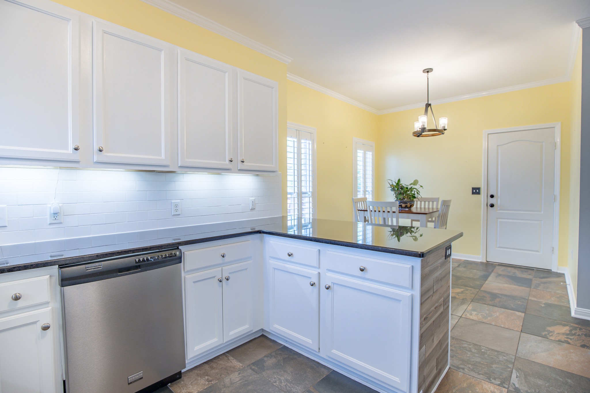4119 Lazarus Way Murfreesboro, TN 37128 - Photo 21 of 47 a kitchen with granite countertop white cabinets and white appliances