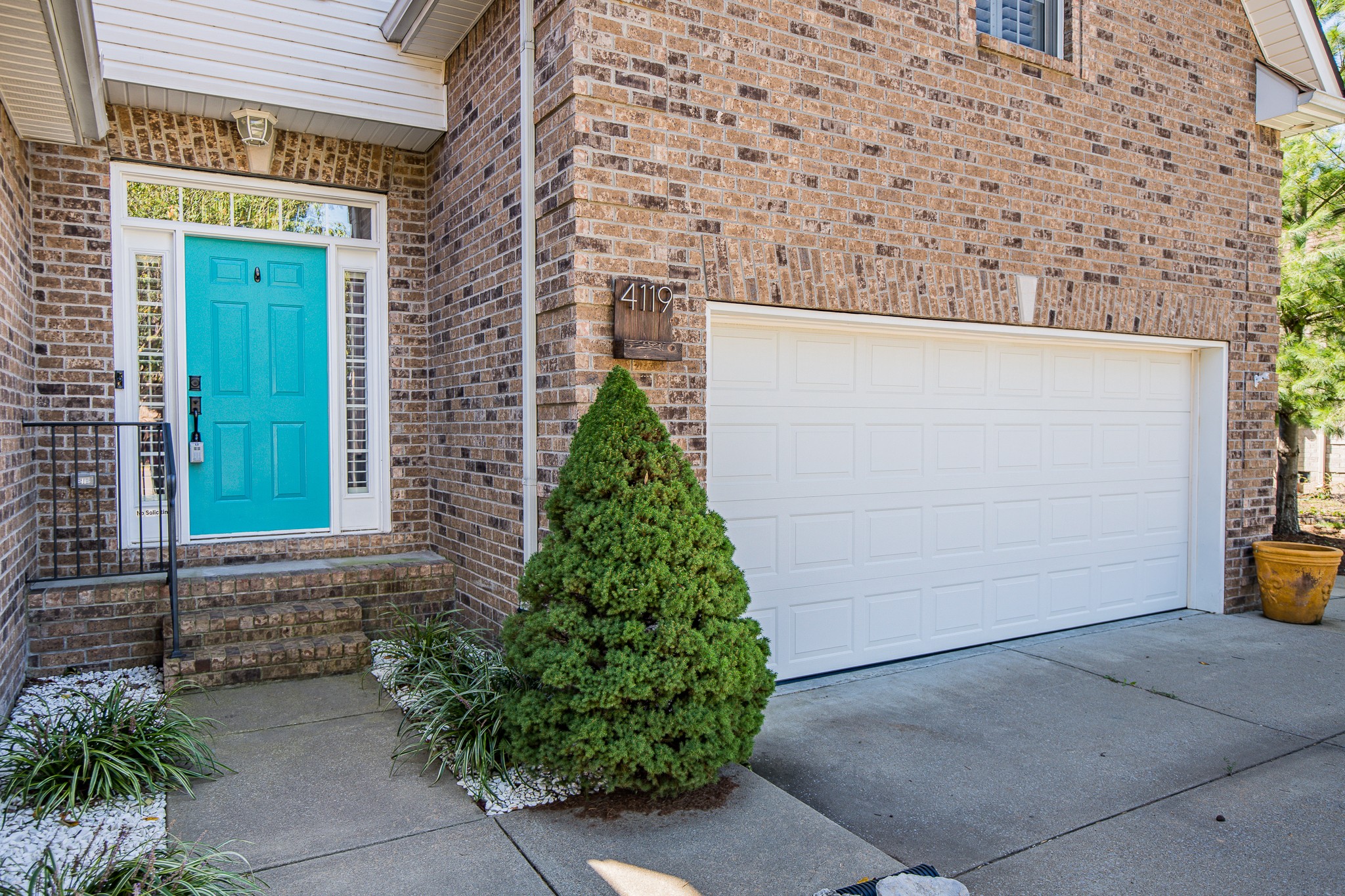 4119 Lazarus Way Murfreesboro, TN 37128 - Photo 3 of 47 a front view of a house with a garden