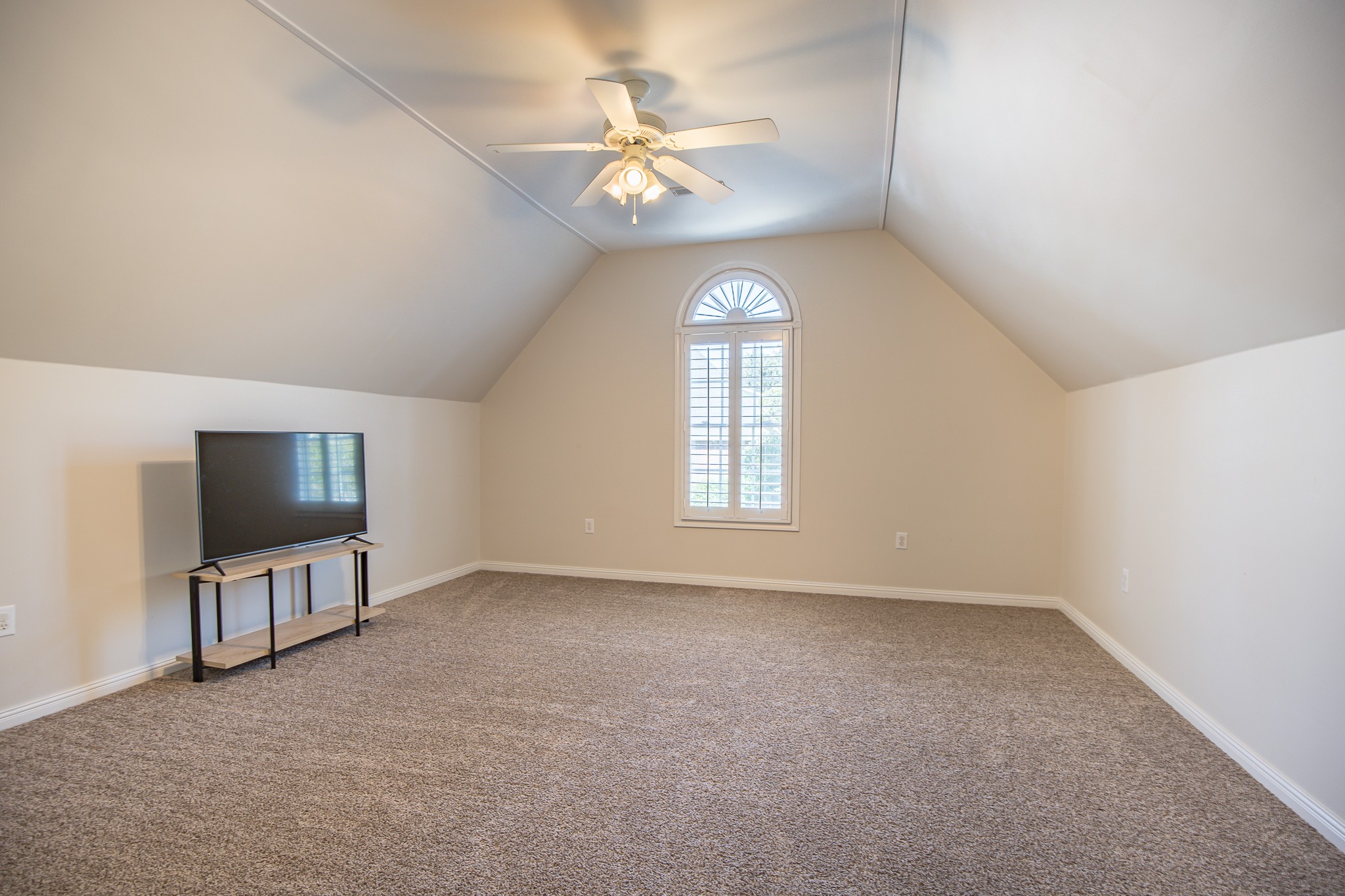 4119 Lazarus Way Murfreesboro, TN 37128 - Photo 35 of 47 an empty room with windows and a chandelier fan