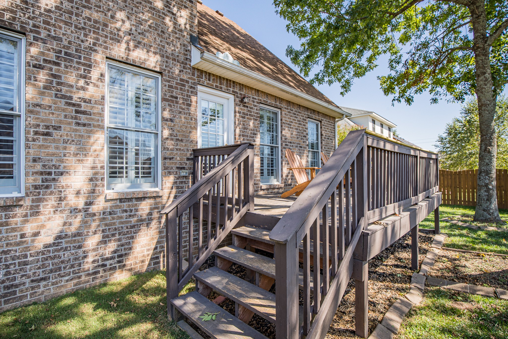 4119 Lazarus Way Murfreesboro, TN 37128 - Photo 43 of 47 a view of deck with wooden floor and fence and a big yard