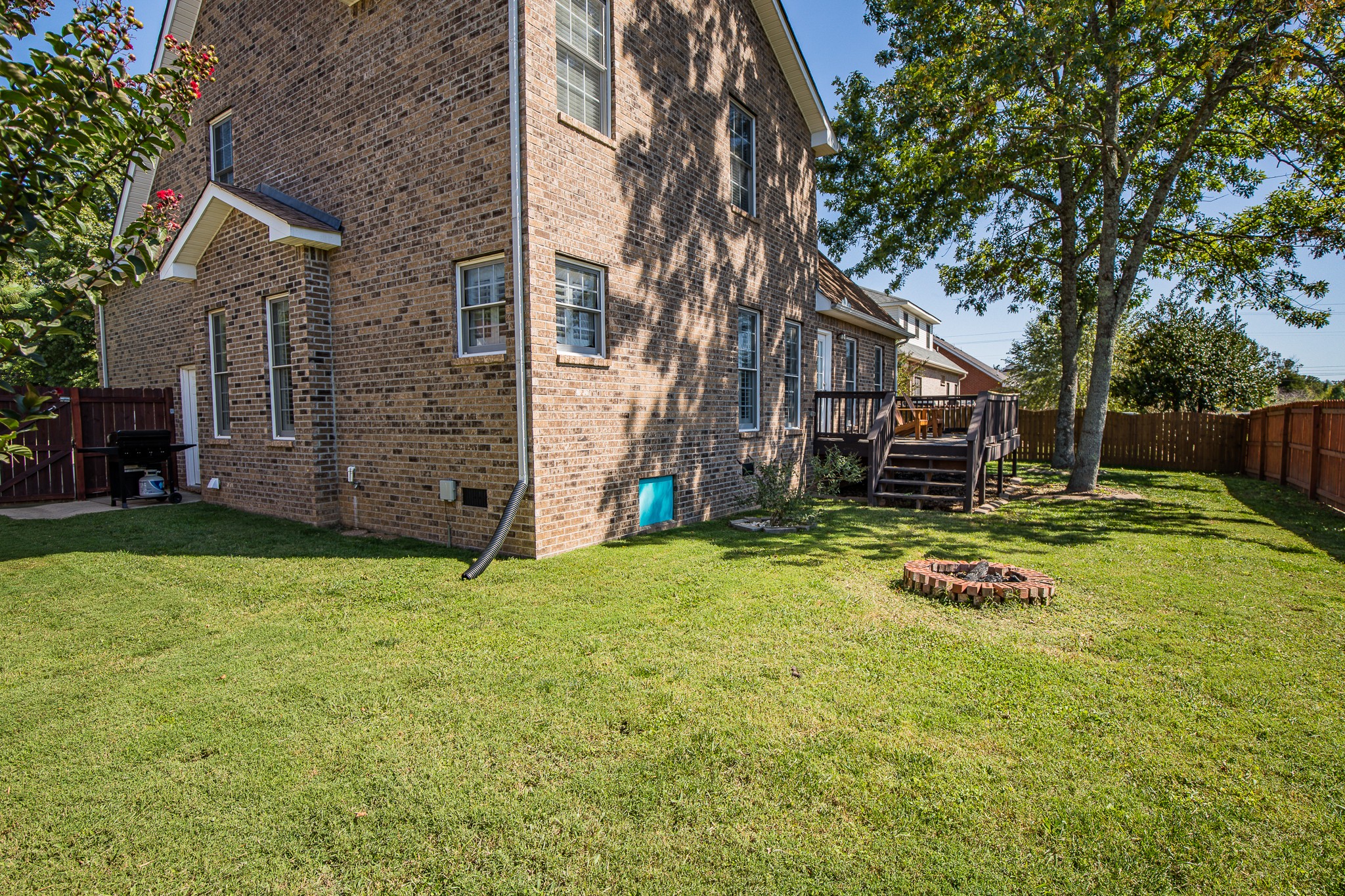 4119 Lazarus Way Murfreesboro, TN 37128 - Photo 45 of 47 a backyard of a house with yard and trampoline