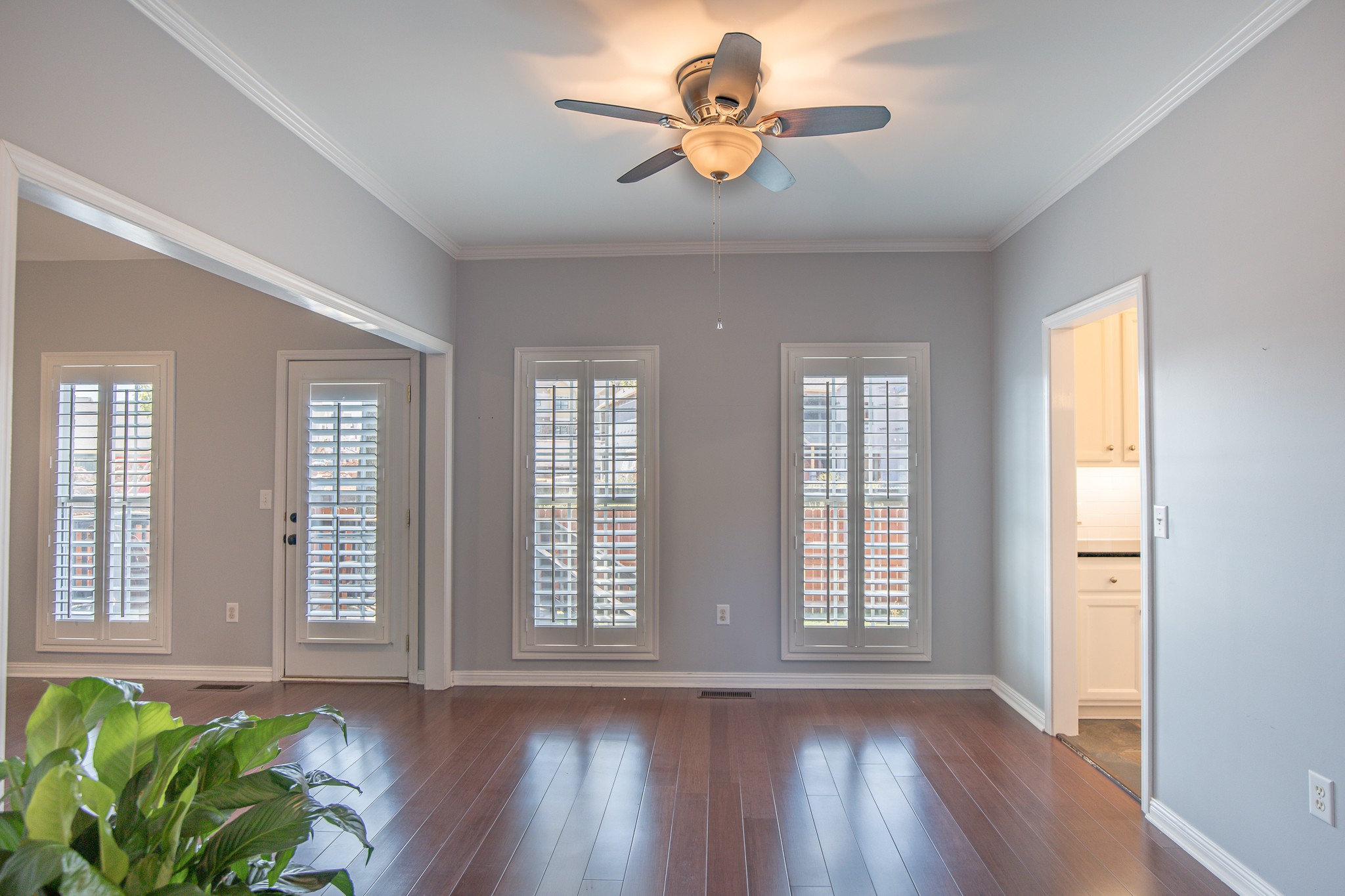 4119 Lazarus Way Murfreesboro, TN 37128 - Photo 7 of 47 a view of an empty room with wooden floor and a window