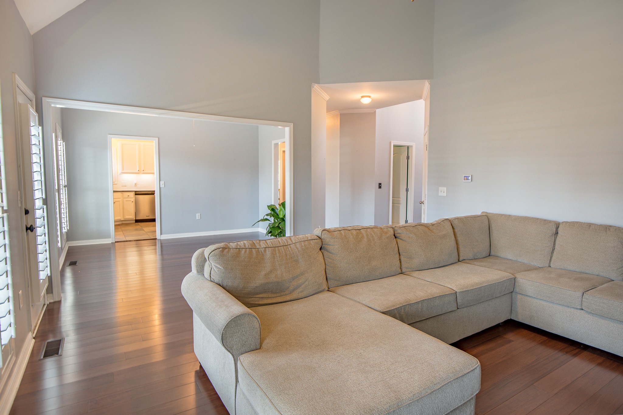 4119 Lazarus Way Murfreesboro, TN 37128 - Photo 8 of 47 a living room with couches and a view of kitchen