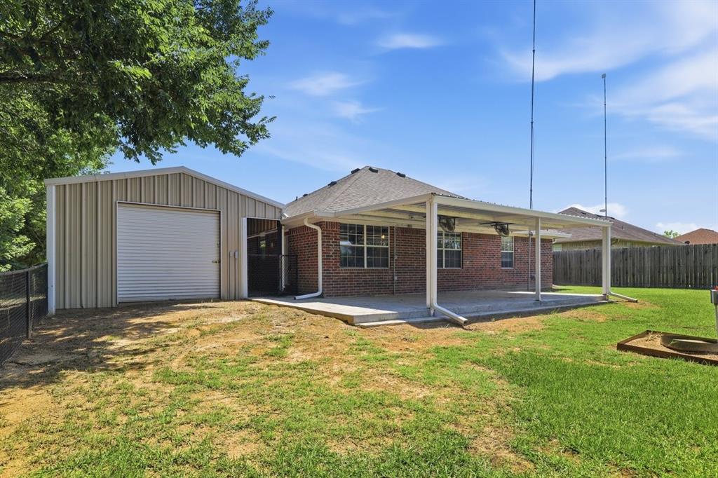 1974 County Road Powderly, TX 75473 - Photo 4 of 28 a view of a house with a yard and sitting area