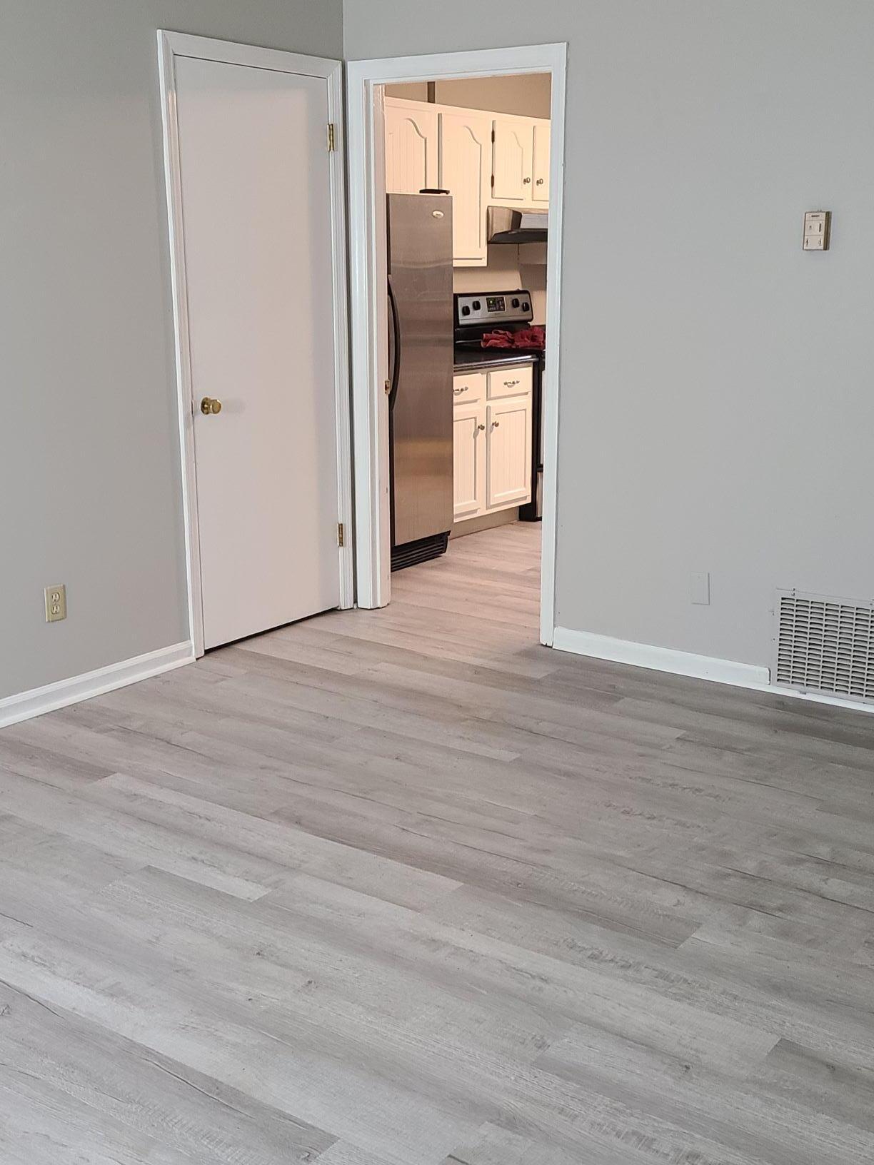 1435 North Forbes Road, Unit 12 Lexington, KY 40511 - Photo 5 of 18 Living room looking into kitchen