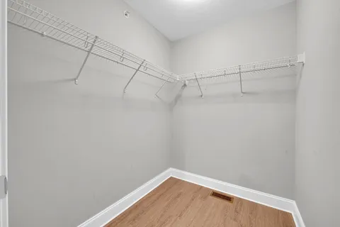 a view of a room with racks on the wall