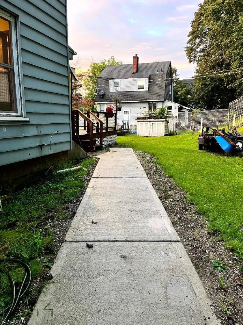 30 Fowler Street Franklin, NJ 07416 - Photo 3 of 27 a view of a back yard of the house