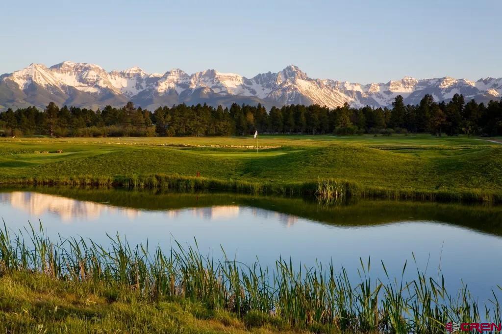 592 South Badger Trail Ridgway, CO 81432 - Photo 21 of 29 a view of a lake with a mountain in the background