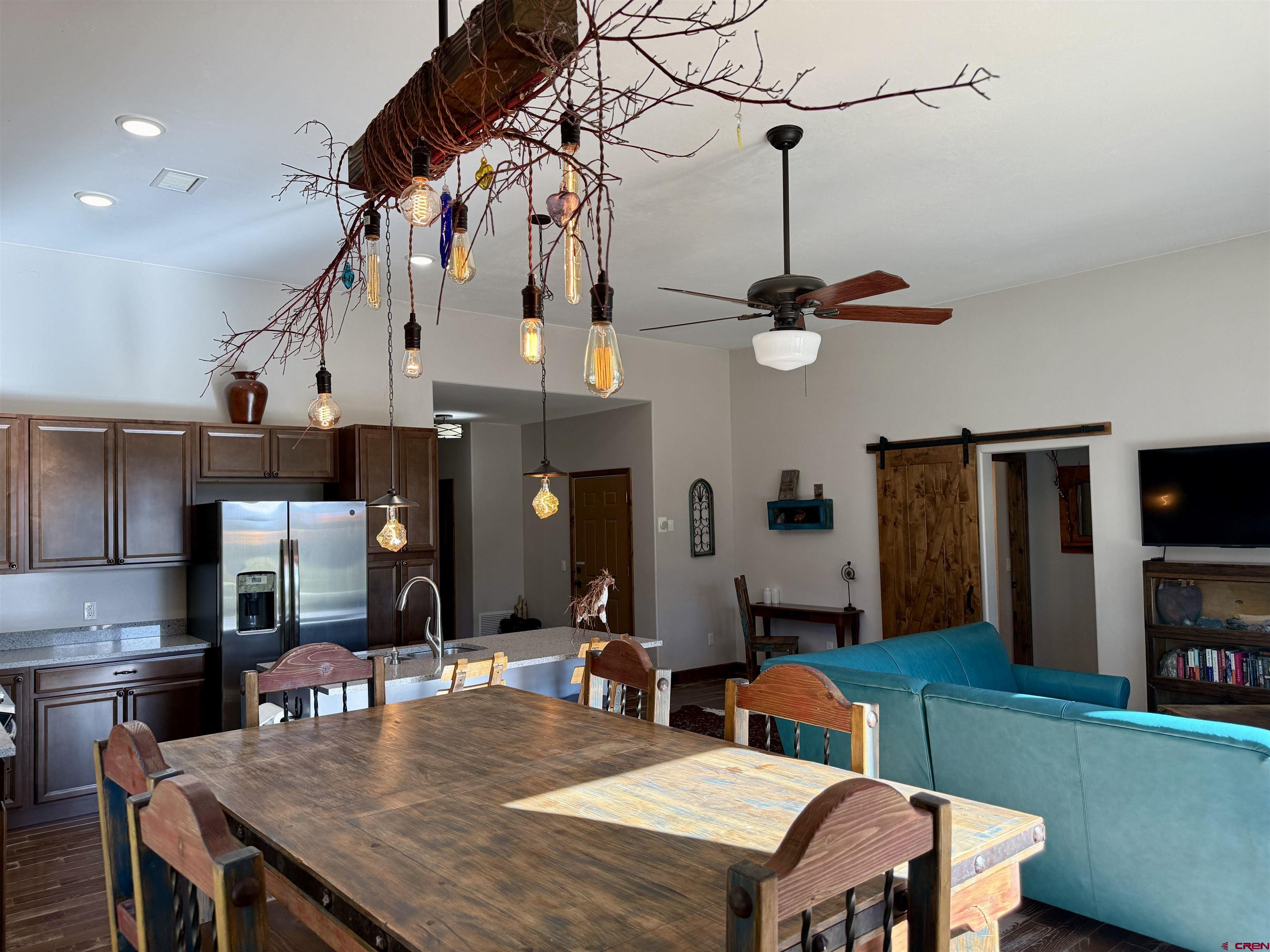 592 South Badger Trail Ridgway, CO 81432 - Photo 4 of 29 a view of a dining room with furniture and a table