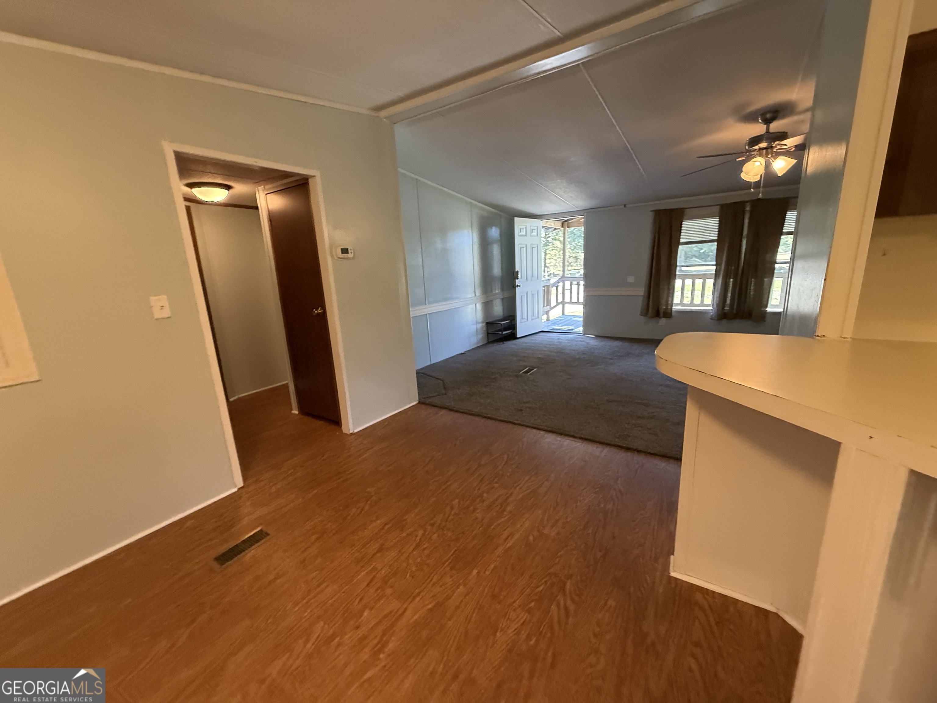 802 Ash Branch Road Pembroke, GA 31321 - Photo 13 of 27 a bedroom with a bed and a large window