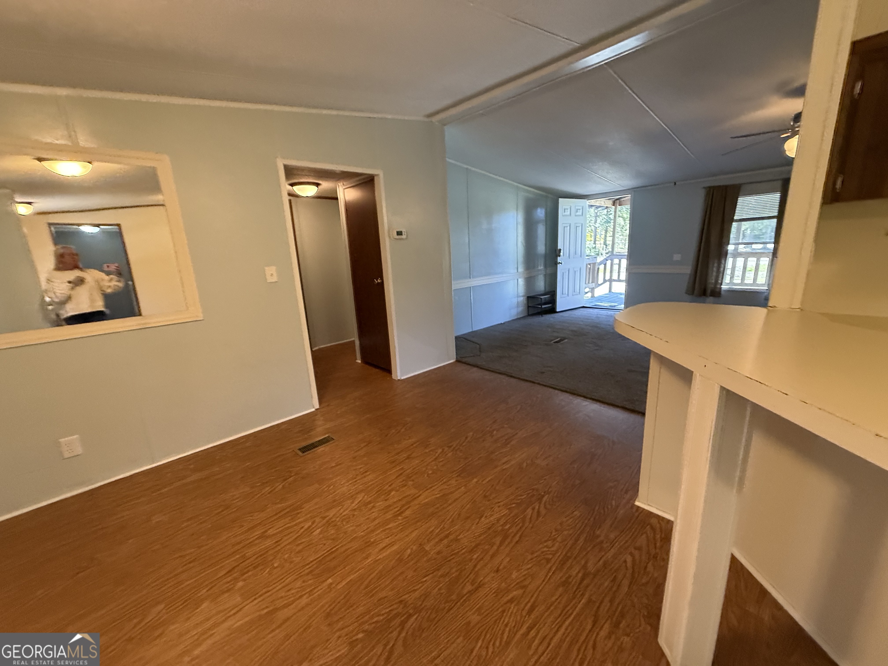 802 Ash Branch Road Pembroke, GA 31321 - Photo 14 of 27 a bedroom with a bed and a table